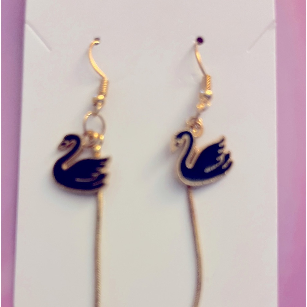 Gold tone bird earrings